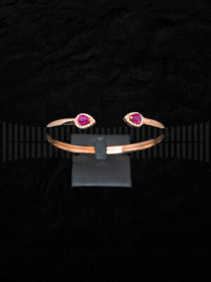 Pulsera Torques en Oro Rosa con Diamantes Brillantes y Rubí