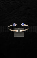 Pulseras Torques Oro Blanco con brillantes y zafiro azul