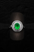 Sortija de Oro Blanco con Diamantes y Esmeralda