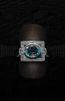 Sortija de Oro Blanco con Circonitas y Aguamarina