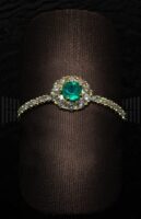 Sortija Roseta Oro Amarillo Brillantes con Esmeralda