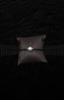 Pulsera acero pavonado con frente oro blanco y perla asturiana