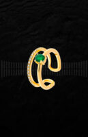 Anillo doble de oro amarillo, esmeralda y diamantes