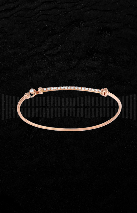 Brazalete de oro rosa de 1ª Ley y diamantes talla brillante