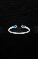 Brazalete de oro blanco de 1ª Ley con diamantes talla brillante y zafiros