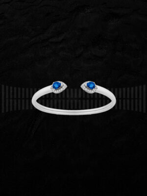 Brazalete de oro blanco de 1ª Ley con diamantes talla brillante y zafiros