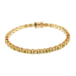 Colección Classics Tennis, Diamante 1.44 ct, peridoto, riviere