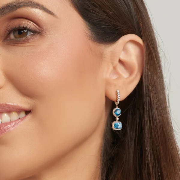 Colección Iconic, Diamante 0.81 ct, topacio y london blue, colgantes